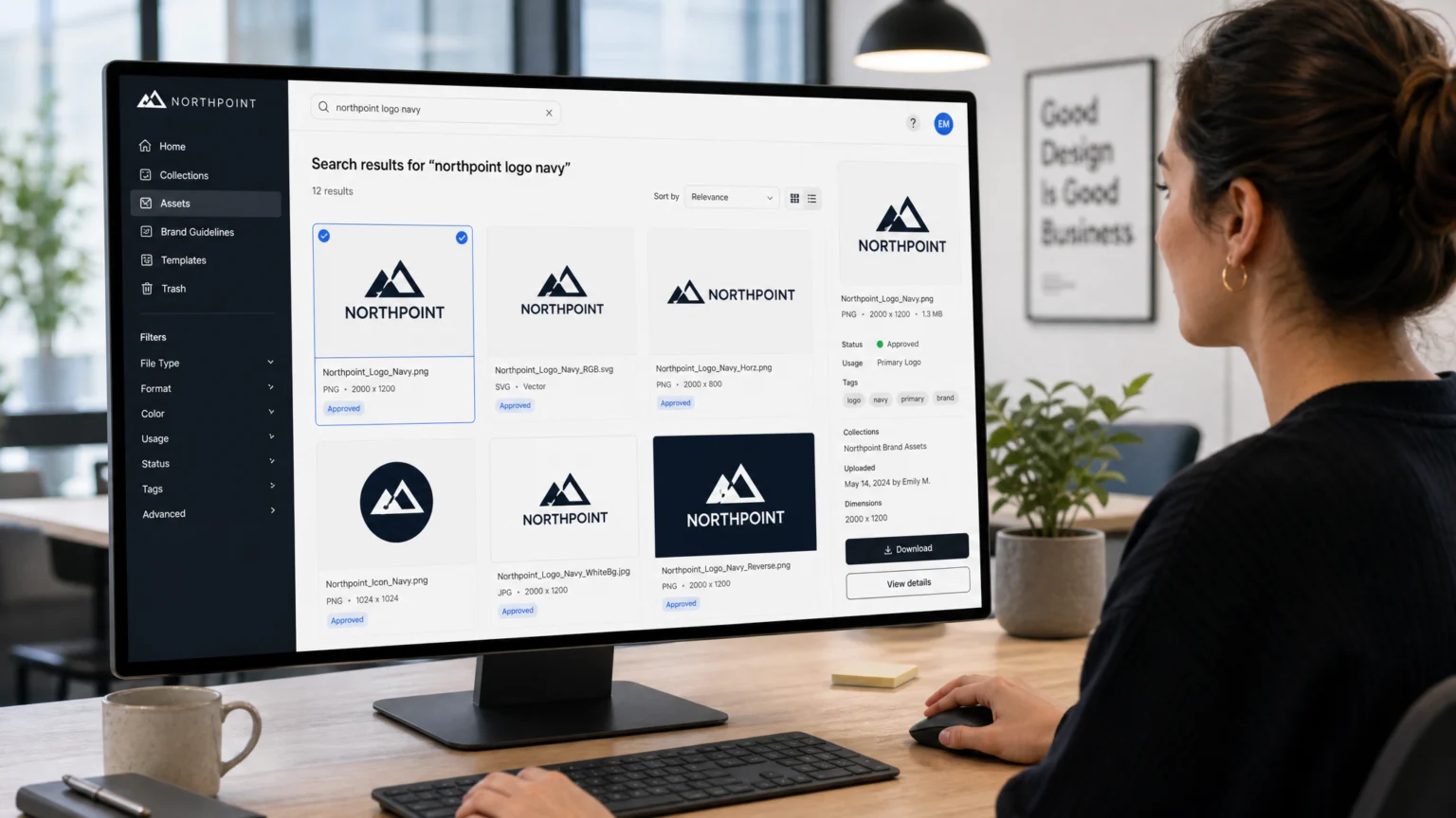 A designer quickly finding a specific logo variant in a well-organized digital asset management system